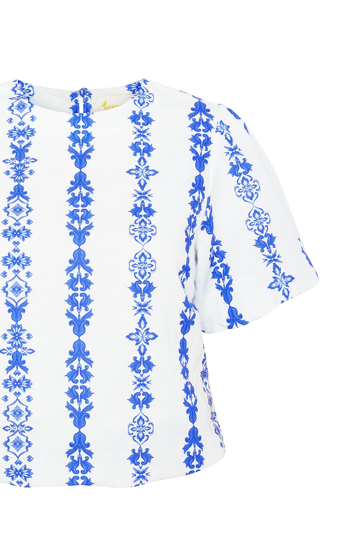blue and white ornate blouse